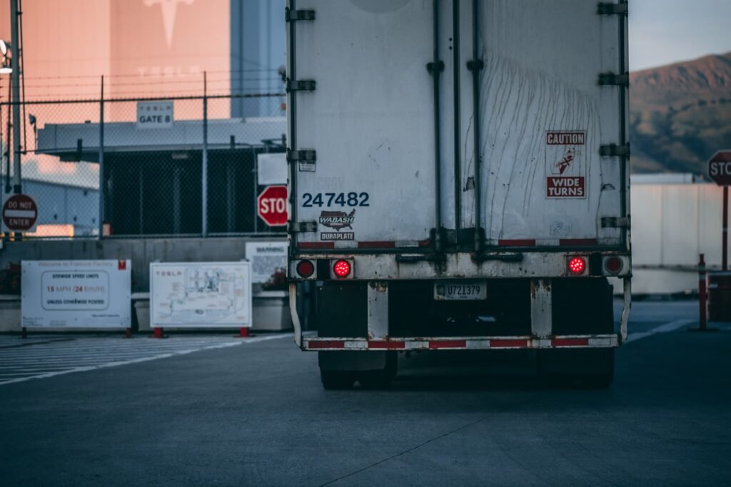Dry van trailer parked at a warehouse gate