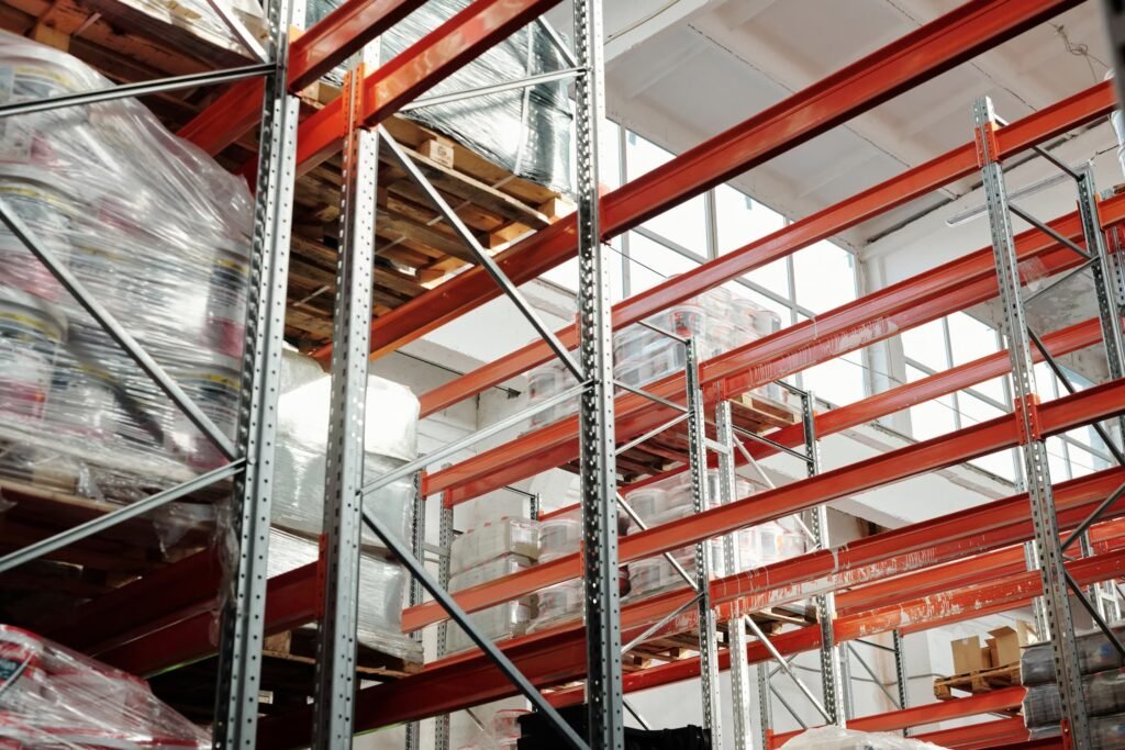 Shrink-wrapped pallets stored on warehouse racks