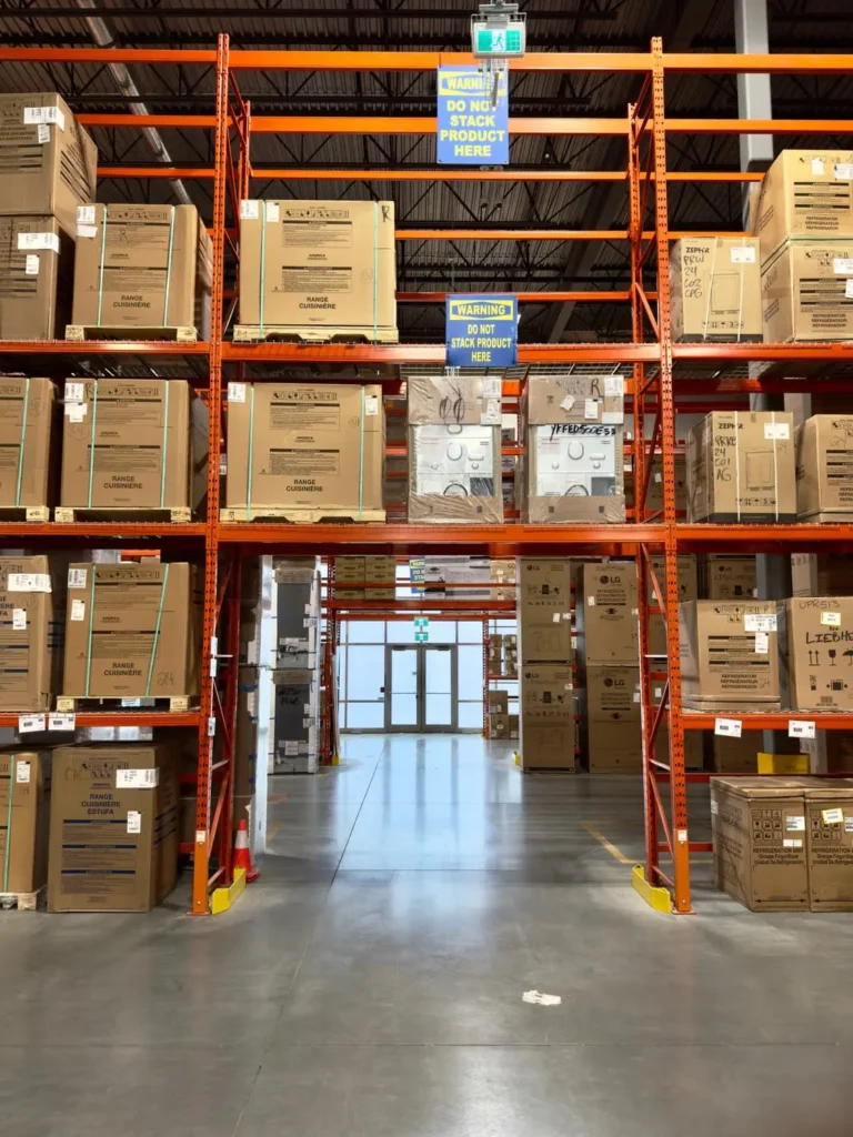 Boxed appliances stored on racks in a warehouse